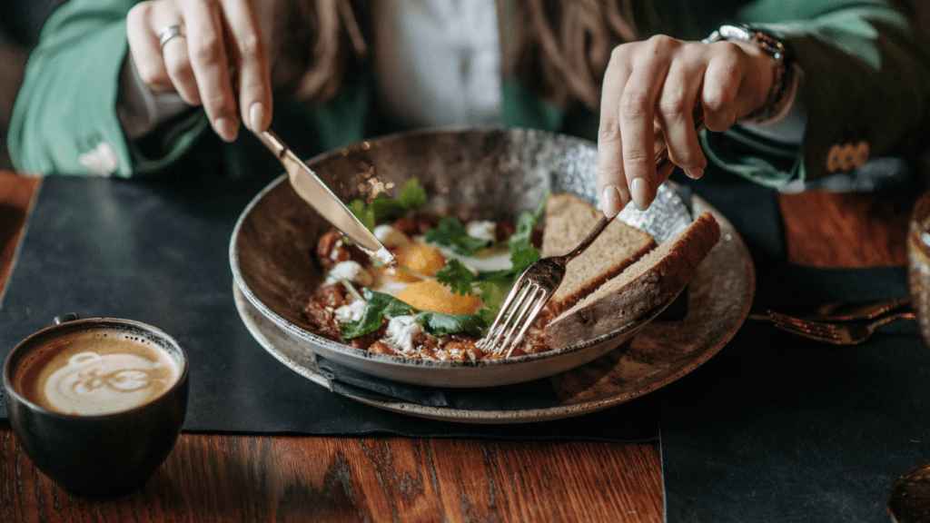 person eating a salad