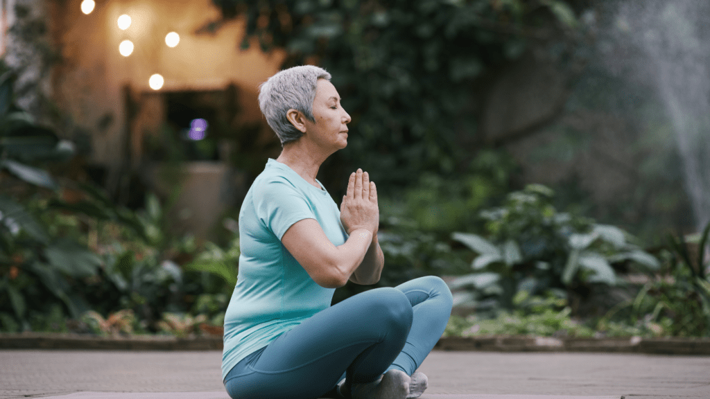 a person is doing yoga outdoor