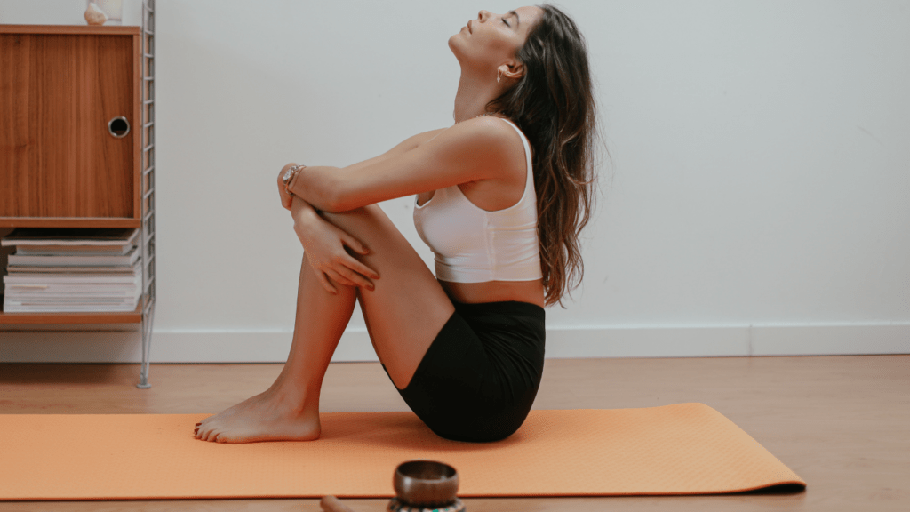 a person is doing yoga in a room