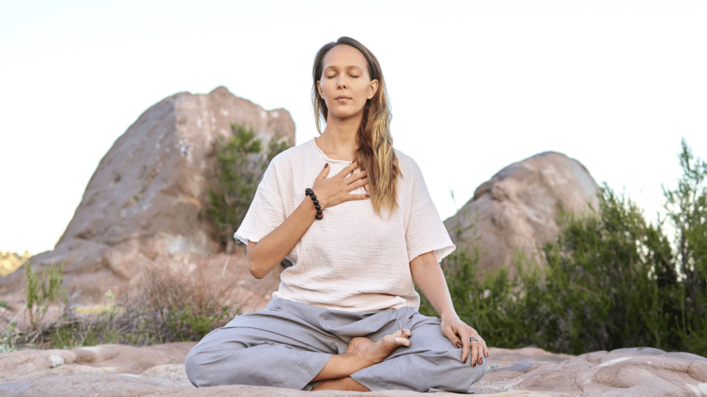 a person is doing yoga outdoor