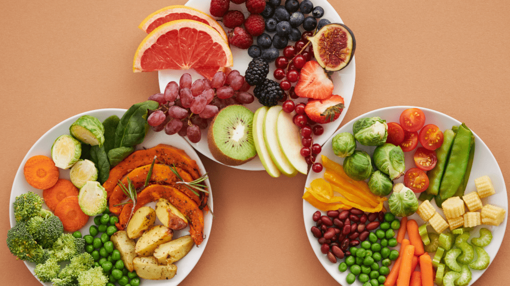 a person is holding a bowl of vegetables on a wooden table