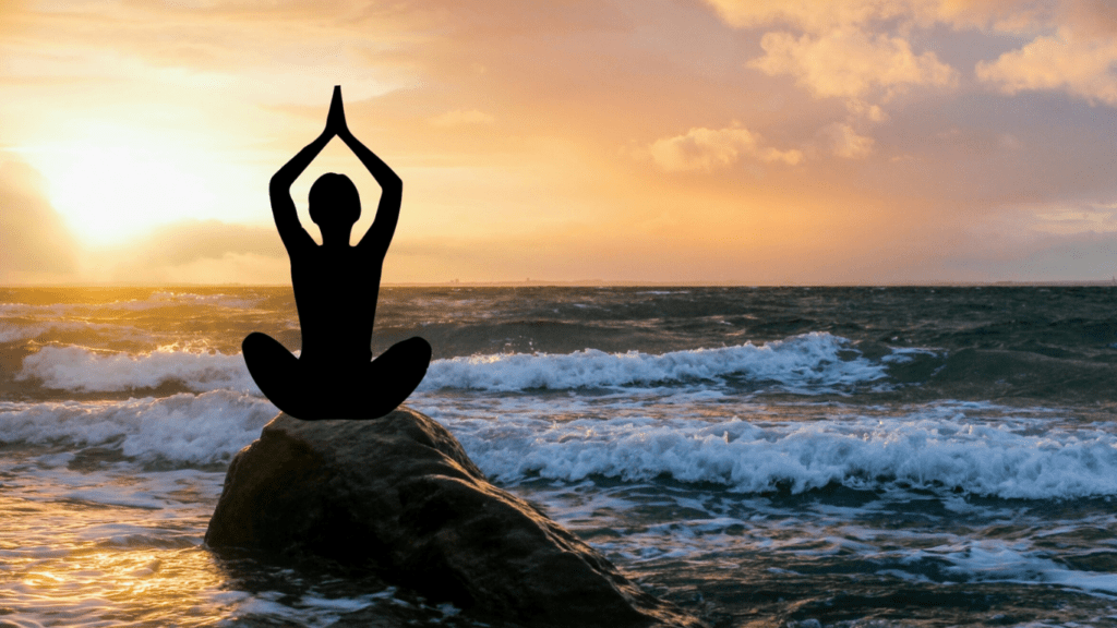 a person meditating on river